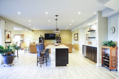 Neutral Toned Basement with Bar