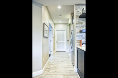 Neutral-Toned-Basement-with-Bar-13